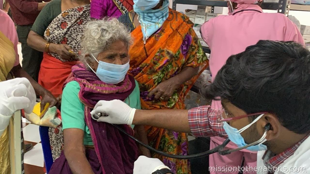 Elderly patient consultation at camp