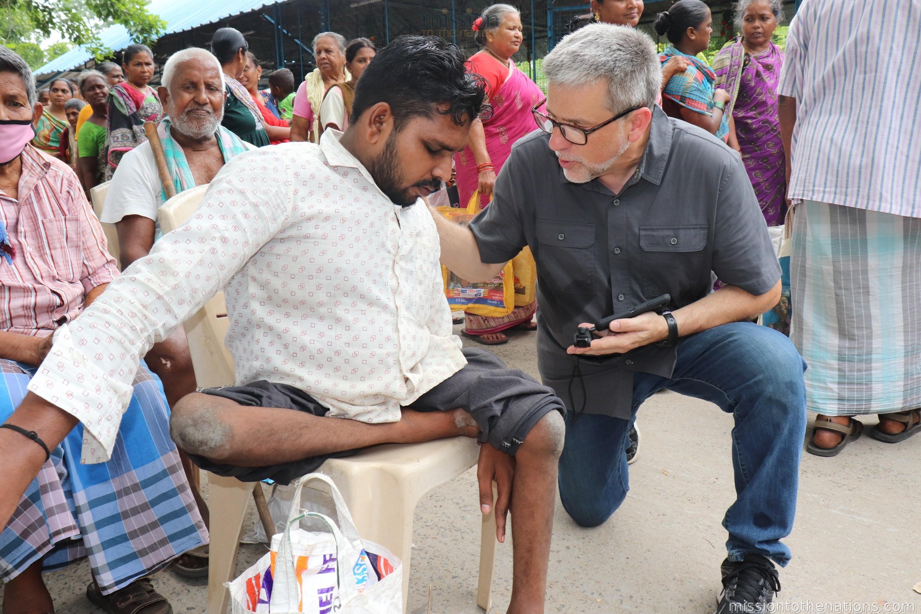 Donor visiting a disabled community member