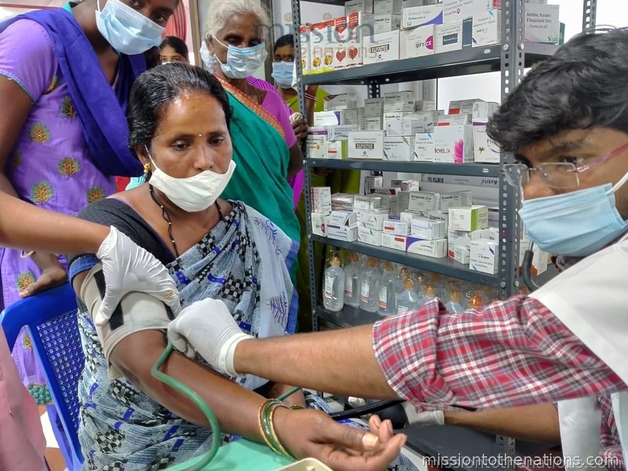 Prenatal checkup at a mobile camp