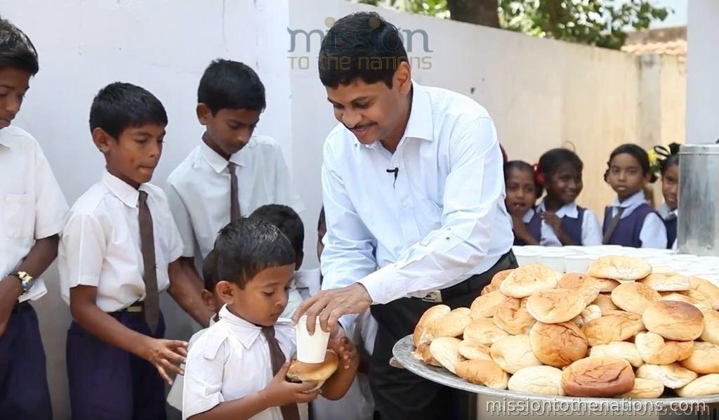 School feeding — bread, milk and a hot meal served daily