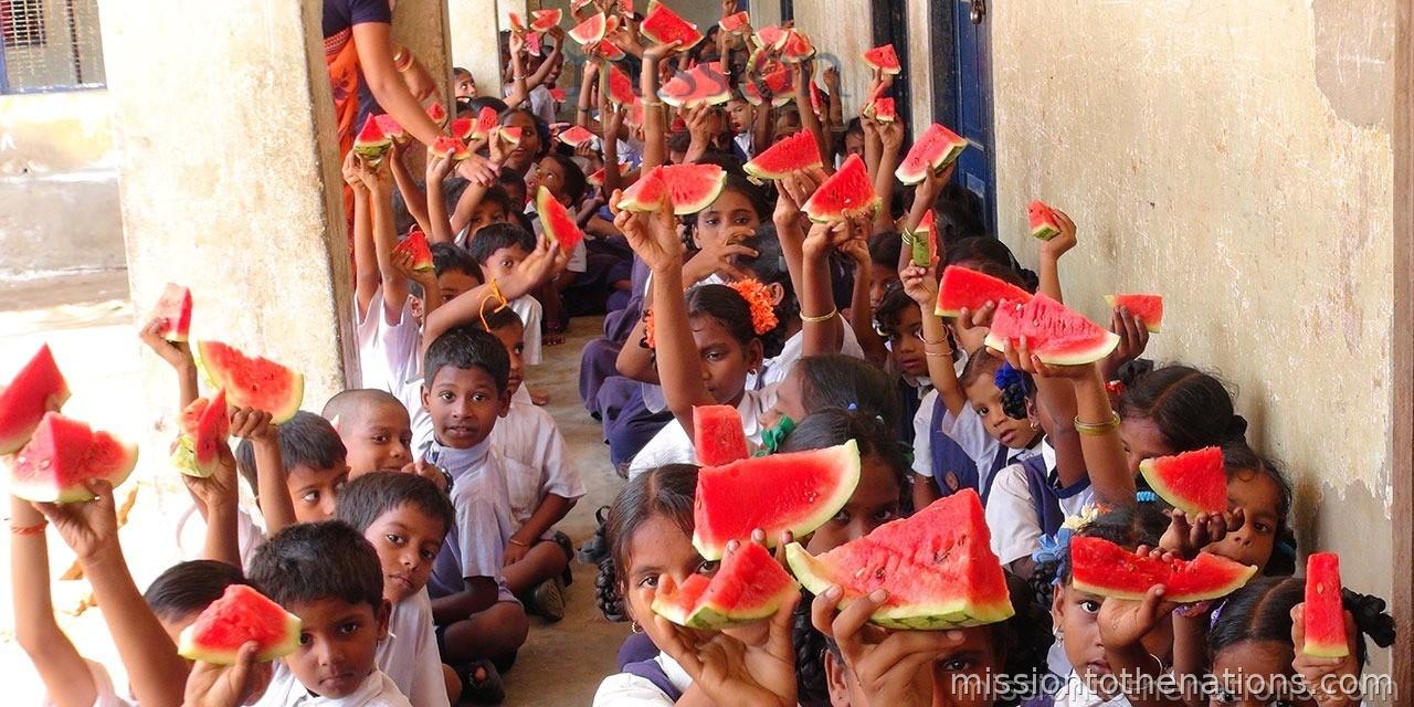 Fruit distribution — every child gets a slice