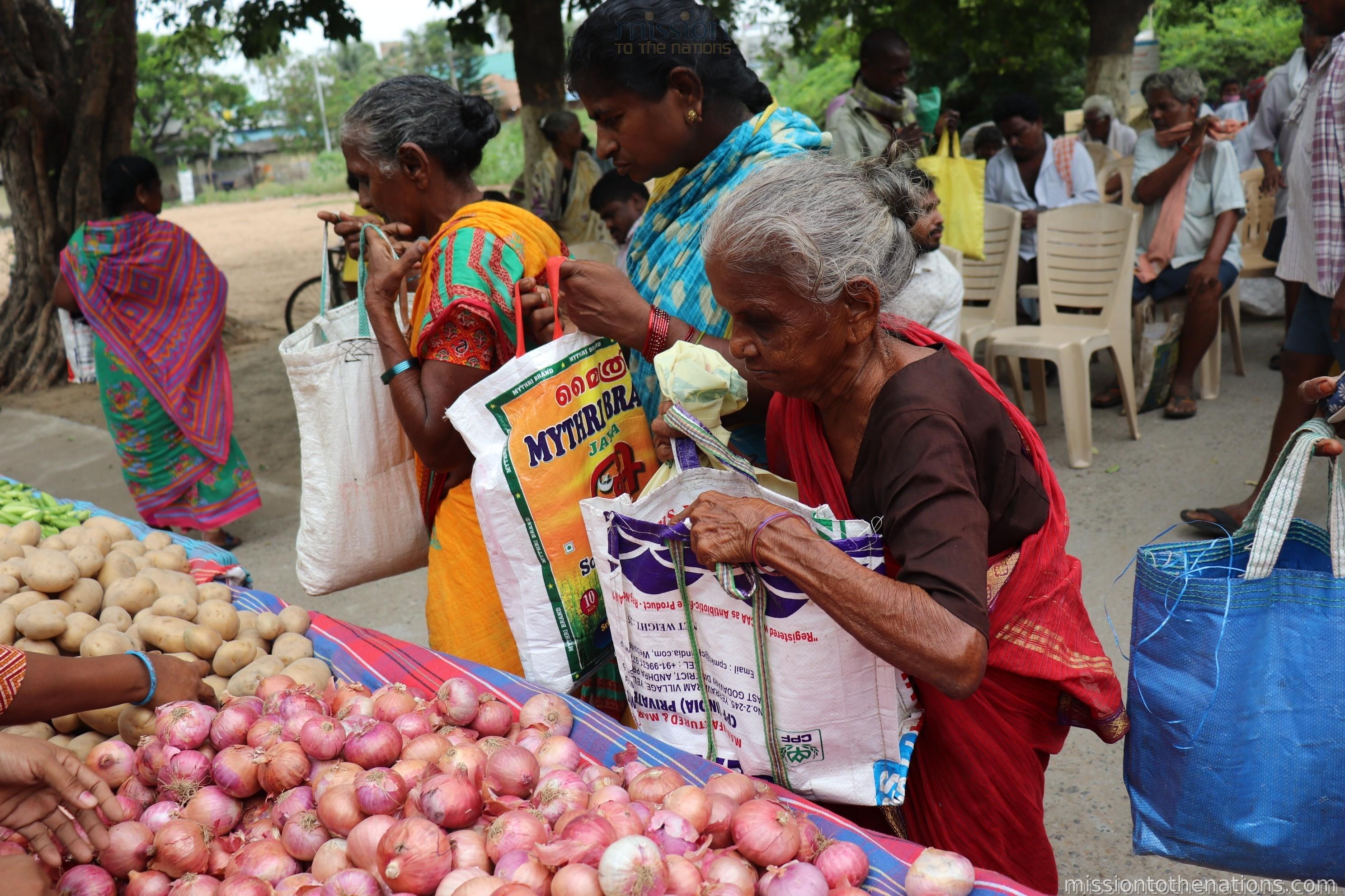 Surplus vegetables delivered to a village